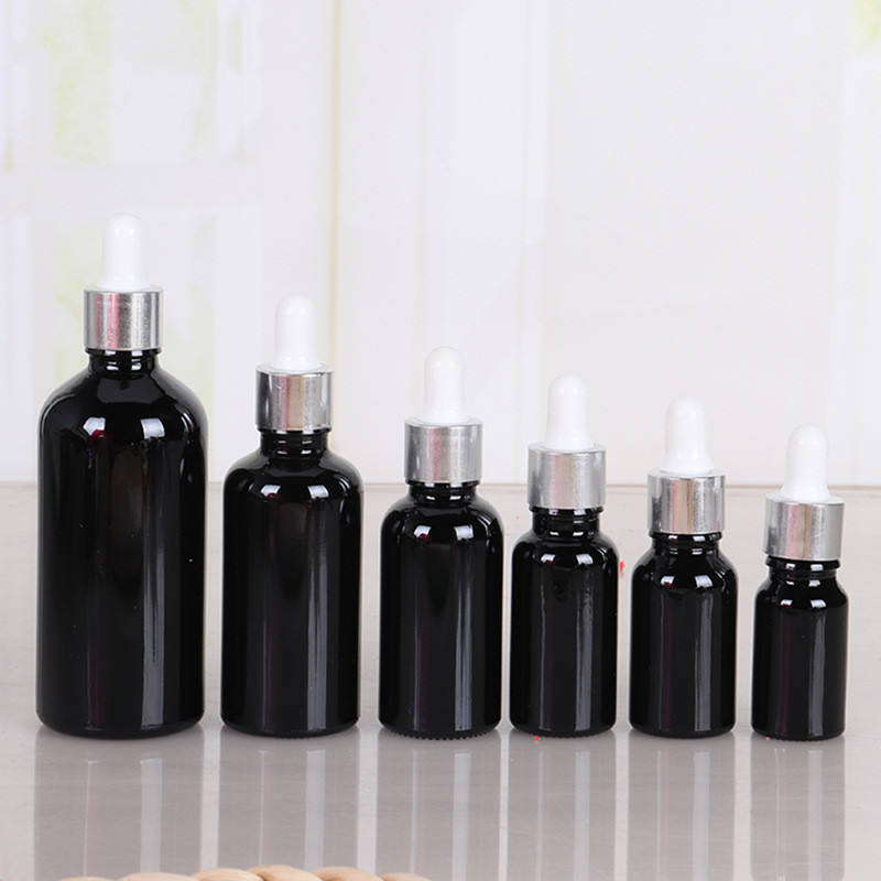 bright black glass bottles and lids
